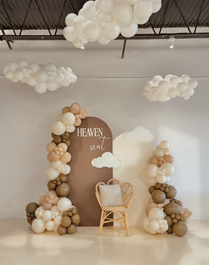 Heaven Sent baby shower with neutral arch backdrop and cloud installation by LUX Event Design